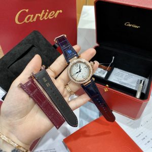 Alternative view of OM Production, Handcrafted Moissanite Ring Edition, 2020's Latest Cartier Pasha Collection! Circular yet square, a world of its own. Wear the Pasha and fear nothing! 😱 1⃣️ Case:316L stainless steel CNC precision-machined! Exterior thickness 9.35mm / Case diameter 35.48mm. Natural sapphire crystal with AR anti-reflective coating. Two deep blue sapphires with full, symmetrical cuts. Smooth, elegant crown guard. Perfectly engineered quick-release lugs for effortless adjustment. Most accessories compatible with genuine Cartier pieces!2⃣️ Movement: Features a modified Cartier 1847MC movement based on Citizen's latest 9039 caliber. Utilizes the original low-profile Citizen 9039 pin shaft, eliminating the need for height modification. Ensures perfectly aligned hour, minute, and second hands, delivering consistent power reserve and precise timekeeping!3⃣️ Dial: The white dial features outward-radiating silver-plated guilloché patterns. This intricate guilloché covers the entire dial surface with sharp, three-dimensional printing. The hour markers are precisely angled with perfectly filled indices. The cutout feet allow interchangeability with genuine parts!4⃣️ Hands: Diamond-shaped deep blue blued hands exhibit profound color depth with a smooth, flat profile. Due to different movements, they are not interchangeable with the genuine article! 5⃣️ Strap:Upper layer crafted from Italian calfskin, underside from French calfskin. Laser-etched markings are precise and sharp. Stainless steel buckle meticulously engraved, fully interchangeable with the original! 6⃣️ Buckle: Features Cartier's latest upgraded buckle design, precision-machined from 316L stainless steel via CNC. The push-button mechanism operates smoothly with optimal resistance. The buckle plate boasts sleek lines and balanced spring tension.with crisp, precise engraving. Ergonomic design ensures exceptional comfort, fully interchangeable with the genuine article! 7⃣️ Inner Case: Constructed from the same paramagnetic alloy as the original, effectively shielding against strong magnetic fields in daily life. Due to differing movement types, not interchangeable! 8⃣️ Bezel:Crafted from 316L stainless steel with CNC precision machining, the bezel features a full-bodied shape with polished transparency, seamlessly matching the case. Its internal groove precision allows interchangeability with the genuine article! 9⃣️ Case Back: 316L stainless steel CNC precision machining, with a fine circular sandblasted finish and clear engraving. Each piece has a unique serial number. Equipped with a custom-shaped gasket for 5ATM water resistance. Its internal groove precision allows interchangeability with the genuine article!⚠️ Bonus Feature: The quick-release mechanism for both case and strap fits perfectly, operating smoothly and effortlessly. Both are compatible with genuine parts. Sold with the same approach as authentic products: purchase one watch and receive an extra leather strap! Crafted by O. Experience it. Appreciate it. Savor every detail!